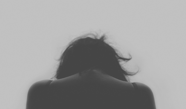 a woman brushing her hair